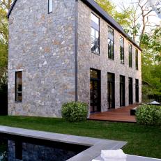 Contemporary Stone House Exterior With Gable Roof