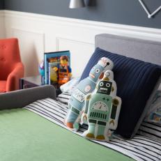 Gray Bed With Robot Throw Pillow in Boys Space Inspired Room