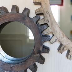 Distressed Wood Gear Mirrors Ty Into the Theme In a Train Inspired Nursery