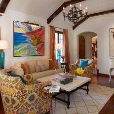 Bright Artwork and Accents Spice Up a Spanish-Style Living Room