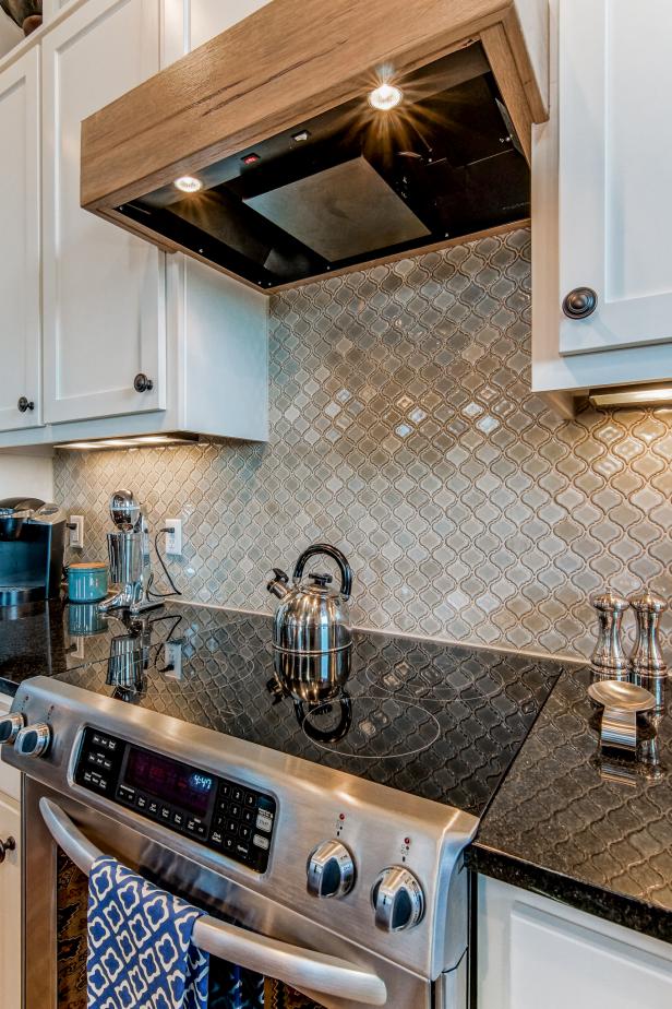 Arabesque Tile Kitchen Backsplash And Wooden Range Hood | HGTV