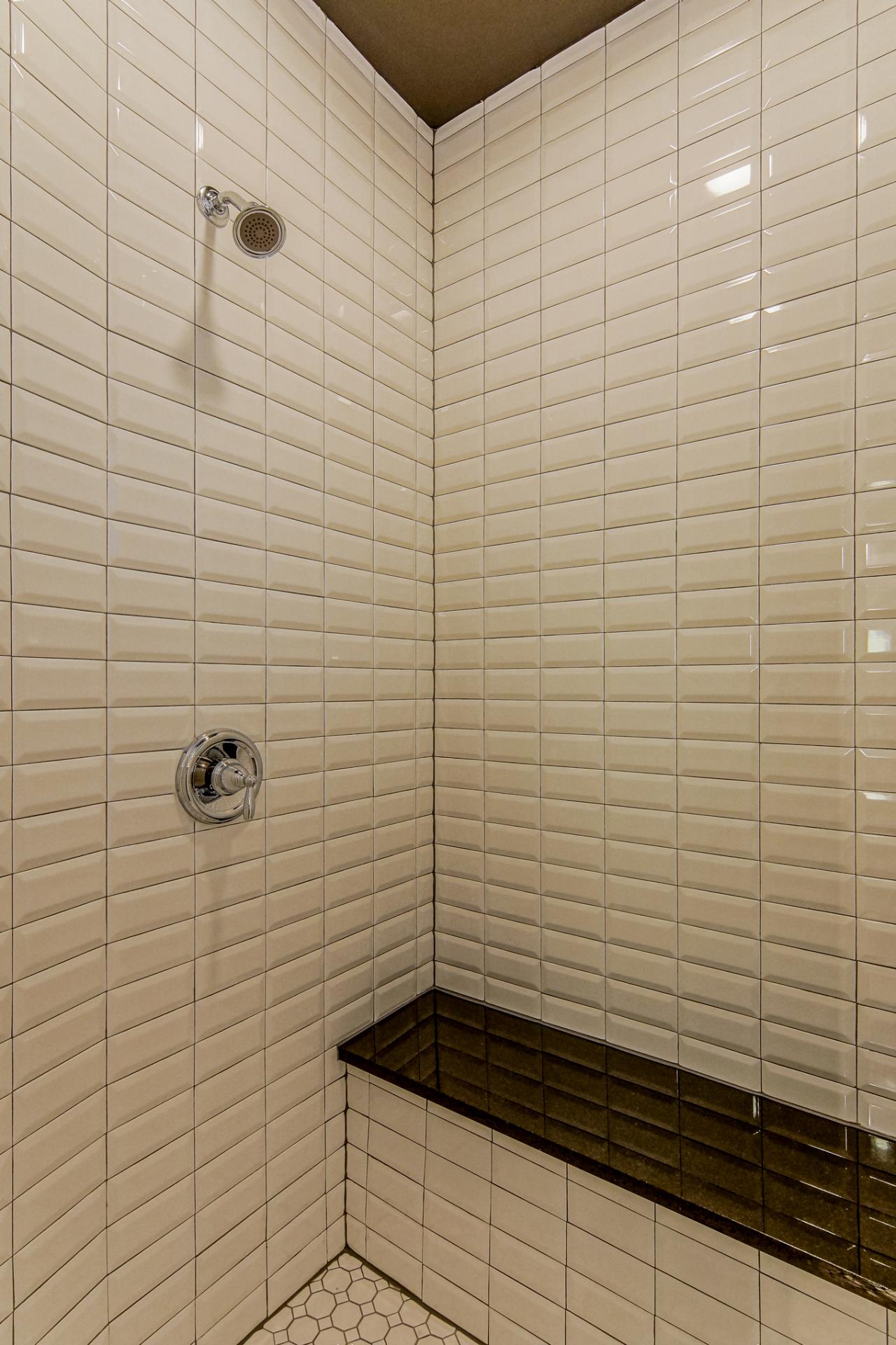 White Subway Tile Shower With Black Shower Bench HGTV