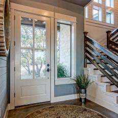 Country Foyer With Farmhouse Front Door