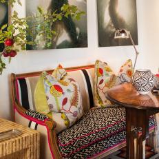 Eclectic Bench With Fun Upholstery and Colorful Pillows