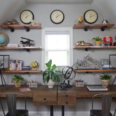 Rustic Home Office With Wall of Shelves