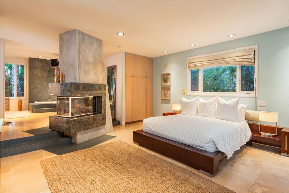 Master Bedroom With Peninsula Fireplace