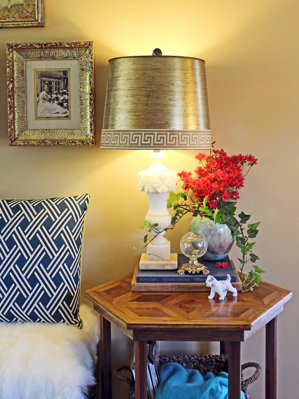 Turn an old trashed drum-style lampshade into a trendy treasure by simply adding Greek key upholstery tape trim.