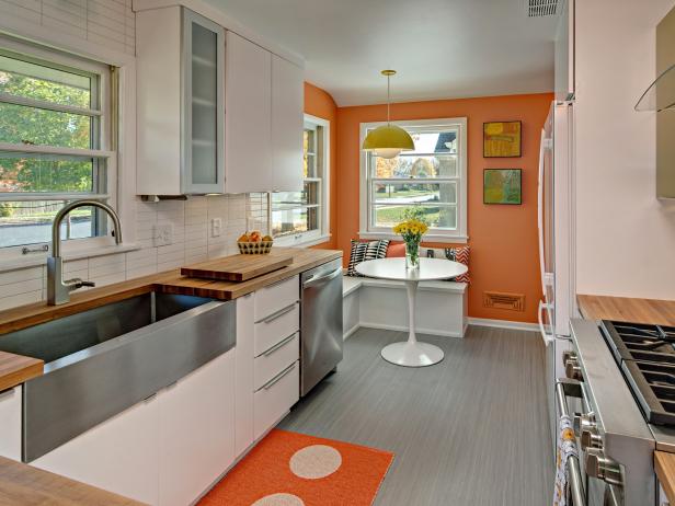 When a former food writer decided to refresh the kitchen in her 1951 home, she turned to kitchen designer Christine Nelson for help. Nelson helped her client increase the counter space and overall efficiency and gave the kitchen the “colorful, updated, Midcentury Modern” look she wanted. “A gray linoleum floor, stacked subway-tile backsplash, and butcher-block counters create a clean backdrop while orange walls, and avocado-green accents add a burst of Mad Men-era color,” says Nelson. Classic period furnishings like a Saarinen-style Tulip Table and a pendant light based on Werner Panton’s Flowerpot design complete the look.