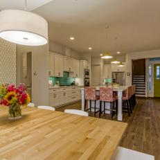 Open Plan Kitchen With Dining Area and Colorful Accents