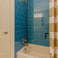 Bathroom With Bright Blue Shower Tiles
