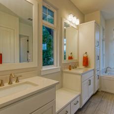 Modern Double Vanity Bathroom With Orange Accents