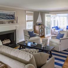 Contemporary Blue and White Living Room With Coastal Accents