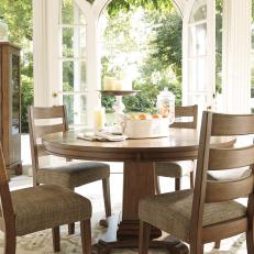 Neutral Cottage Dining Room With Round Table
