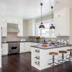 Spacious Traditional Kitchen With Intriguing Wood Seat Barstools, Gunmetal Pendant Lights and Blurred Effect Tile Backsplash 