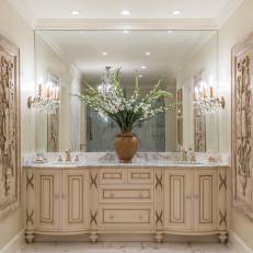 Enchanting Traditional Vanity With Full-Wall Mirror, Decorative Cream Cabinetry and Marble Countertop 