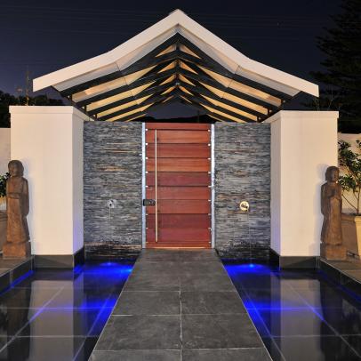 Contemporary Asian Courtyard With Wooden Front Door