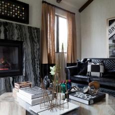 Living Room With Black-and-Gray Marble Fireplace
