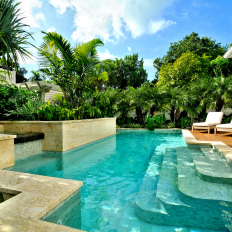 Pool With Waterfall and Tropical Landscaping