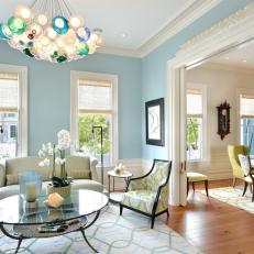 Blue Contemporary Living Room With Colorful Chandelier