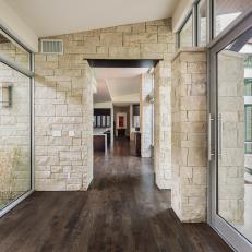 Contemporary Hallway With Stacked Stone Walls