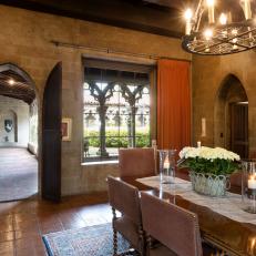 Chandelier Brightens Castle-Inspired Dining Room