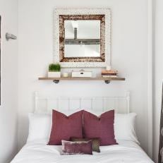 Vintage Mirror and White Poster Bed in Small Bedroom