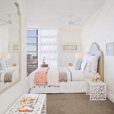 White Coastal Bedroom With Wooden Headboard