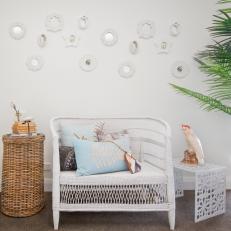 White Coastal Sitting Area With Wicker Chair