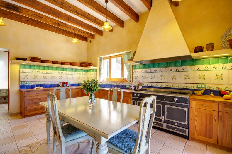Mediterranean Kitchen With Green Tile