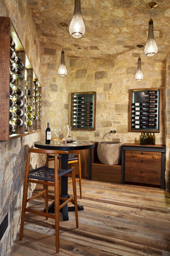 Wine Cellar With Gray Stone Ceiling and Walls