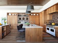 Neutral Kitchen With Two Islands and Medium Grain Wooden Cabinets