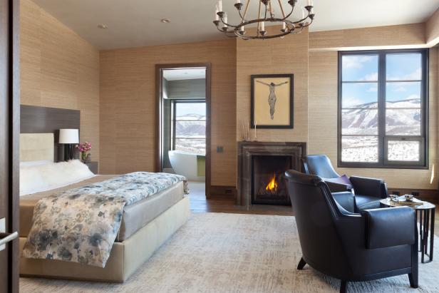 Neutral Bedroom With Textured Wallpaper and Mountain View