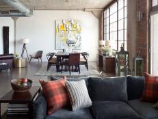 A Denver attorney with an urban loft needed a space where he could comfortably work and entertain. Designer Colin Griffith delivered a made-to-measure home inspired by menswear that easily transitioned from focused workspace to hip bachelor pad.