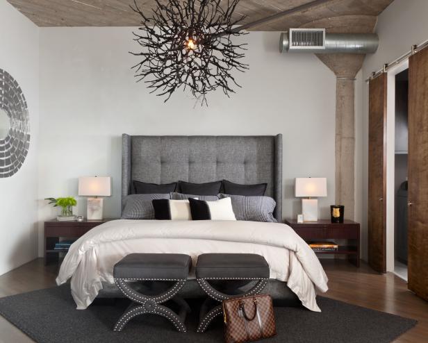 Gray and White Bedroom With Metal Light Fixture