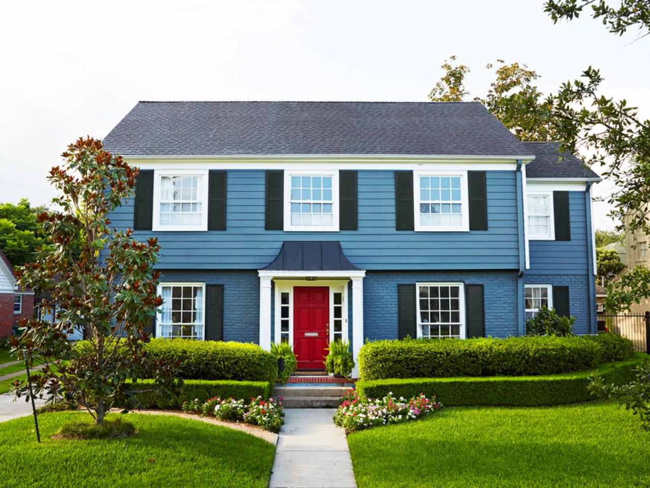 Exterior Of Blue House With Red Door Hgtv
