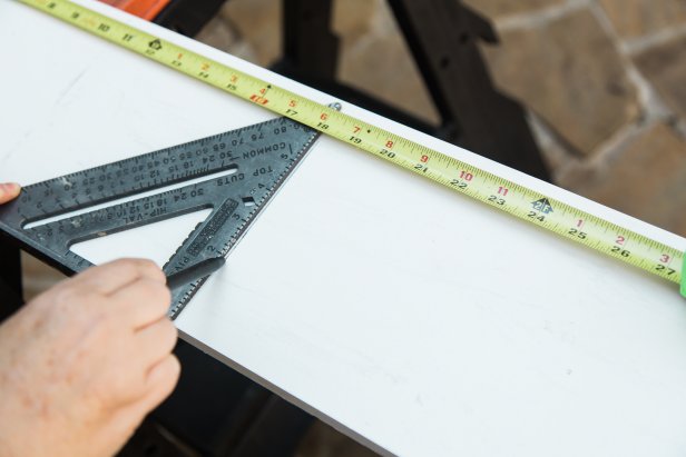 Have the three pieces of wood cut for you at a home improvement center or measure and mark 3 pieces of the 1”x 8” pine at 18 inches long, then cut them using a circular saw at home. Sand off any rough edges, as needed.