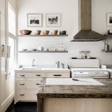 Floating Shelves, Natural Wood Island and White Subway Tile Backsplash Wall in Country Kitchen 