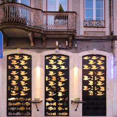 Steel Doors with Bird and Fish Help to Create Ocean Ambiance