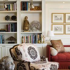 Bookcase and Cushioned Armchair in Family Room