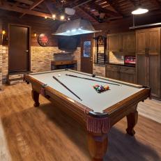 Brown Rustic Game Room With Pool Table