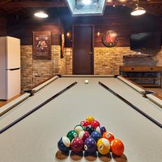 Game Room With Pool Table and Fridge