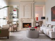 Gray Transitional Living Room With Statuesque Fireplace