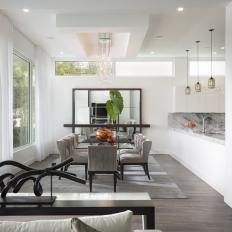 Modern, White Dining Room is Spacious