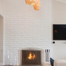 White Brick Fireplace and Lantern Pendants