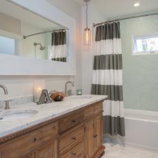 Double Vanity Bathroom With Blue Tile Shower