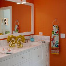 Orange Bathroom With Colorful Towel