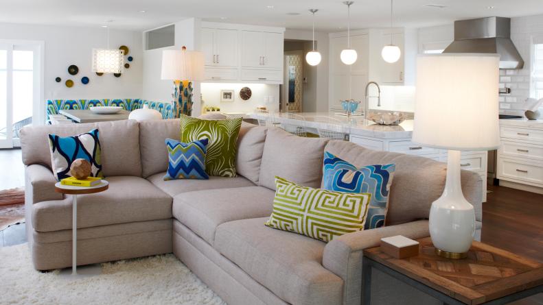Beige Sectional With Blue Pillows