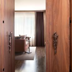 Double Wood Doors With Sculptural Knobs