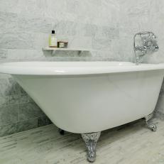 Classic Claw Foot Tub in Marble Tiled Bathroom