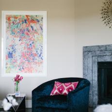 Blue Armchair and Colorful Art